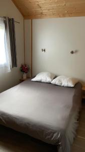 Postel nebo postele na pokoji v ubytování Chalet DODO