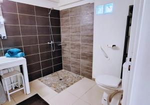 Koupelna v ubytování Ti Zandoli - Évasion avec mini-piscine