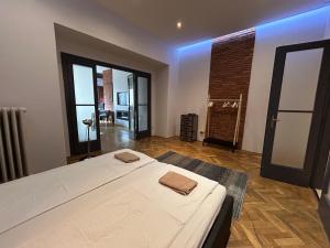 Posteľ alebo postele v izbe v ubytovaní New Design Apartment - Fashion Street