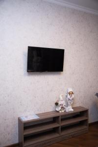 Televízia a/alebo spoločenská miestnosť v ubytovaní Apart-Sol Polyana Resort
