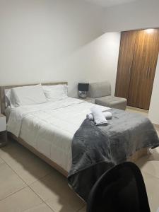 Katil atau katil-katil dalam bilik di Casa Hostal los Profes