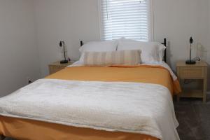 Letto o letti in una camera di Rustic Hive - Wyoming