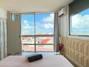 Voodi või voodid majutusasutuse PENTHOUSE 10 MIN port croisière et aéroport toas