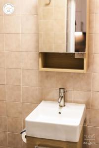 Et badeværelse på Résidence Le Bois D'aurouze - Joli studio rénové au pied des pistes MAE-7784 + 13 billeder