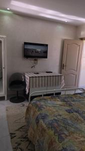 TV a/nebo společenská místnost v ubytování Zayed Villa with 4 apartments , Giza , 6 of October,Sheikh Zayed,Egypt شقق فلا الشيخ زايد
