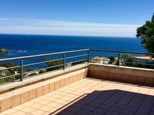a balcony with a view of the ocean at Sensational Apartment with panoramic views in Llança