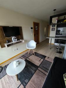 Kuchyň nebo kuchyňský kout v ubytování APART HOTEL EN BULNES