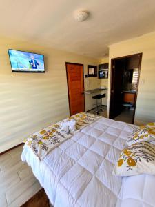 Postel nebo postele na pokoji v ubytování APART HOTEL EN BULNES