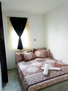 Postel nebo postele na pokoji v ubytování ROYAL VIEW Apartments