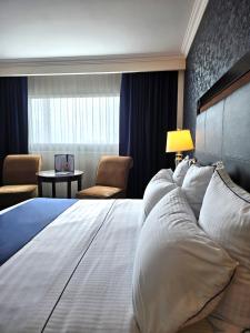 Postel nebo postele na pokoji v ubytování Hotel Two Select + 37 fotografií