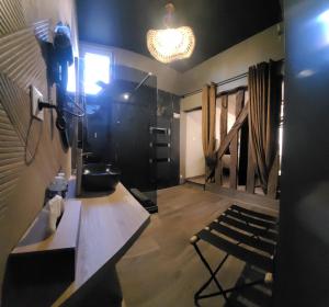 a person taking a picture of a room with a table at Tresors de Sens in Sens