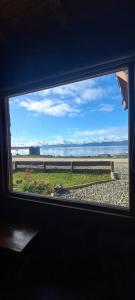 a view from a window of a train at Bosque Del Sur Cabañas in Ushuaia