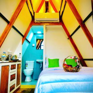 Katil atau katil-katil dalam bilik di The WE2 - Wildwood Elegance Escape