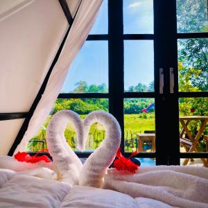 Katil atau katil-katil dalam bilik di The WE2 - Wildwood Elegance Escape