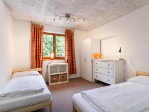 Postel nebo postele na pokoji v ubytování Villa Kitz Kombination