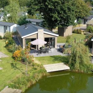 Κήπος έξω από το Wellness Chalet Veluwemeer