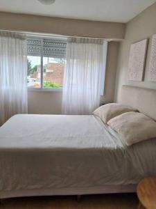 Postel nebo postele na pokoji v ubytování PH Noe + 4 fotografie