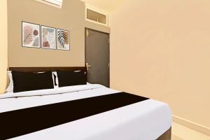 Postel nebo postele na pokoji v ubytování Super Hotel O INN11 Near Central Station