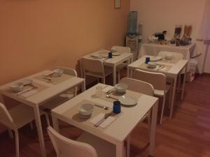 Restoran või mõni muu söögikoht majutusasutuses Casina Dei Marsi