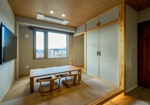 TV a/nebo společenská místnost v ubytování Hotel and Spa Gift TAKAYAMA
