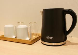 Příslušenství pro přípravu čaje a kávy v ubytování Hotel and Spa Gift TAKAYAMA