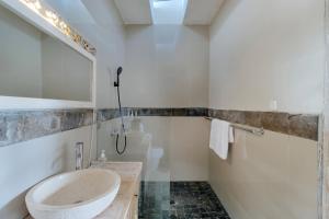 Koupelna v ubytování Villa Nakula Suites