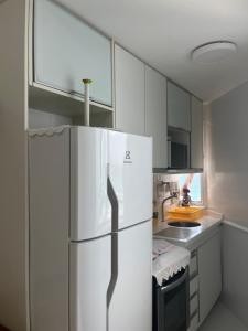 Kuchyň nebo kuchyňský kout v ubytování Ap 210 Bahia Flat, Barra