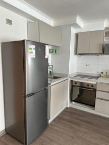 Kuchyň nebo kuchyňský kout v ubytování Depto Nuevo Chillan Centro 2D-2B-E privado