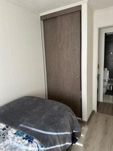 Postel nebo postele na pokoji v ubytování Depto Nuevo Chillan Centro 2D-2B-E privado