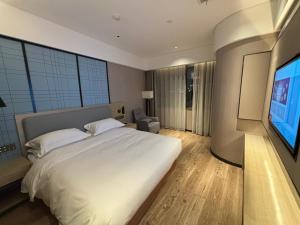 Imagen de la galería de Echarm Hotel Wuhan High Speed Railway Jianji Road Metro Exit, en Wuhan