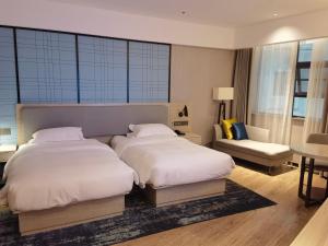 Imagen de la galería de Echarm Hotel Wuhan High Speed Railway Jianji Road Metro Exit, en Wuhan