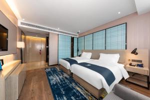 Fotografie z fotogalerie ubytování Echarm Hotel Wuhan Jiefang Park Zhaojiajiao Metro Station v destinaci Wu-chan