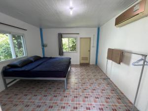 Postel nebo postele na pokoji v ubytování Janzo House