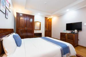 TV a/nebo společenská místnost v ubytování CAMY Hotel Vung Tau