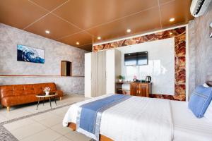 Postel nebo postele na pokoji v ubytování CAMY Hotel Vung Tau