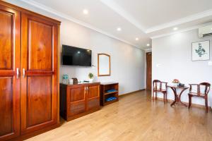 TV a/nebo společenská místnost v ubytování CAMY Hotel Vung Tau