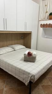 Postel nebo postele na pokoji v ubytování Locazione Turistica Sa Tùrre