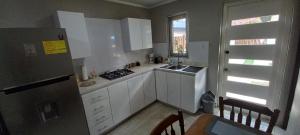 Kuchyň nebo kuchyňský kout v ubytování SEMEREL APARTMENT