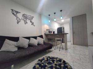 Η κουζίνα ή μικρή κουζίνα στο Hermoso apartamento en el mejor sector de Armenia +17 φωτογραφίες