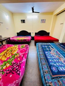 Giường trong phòng chung tại G Mount Budget Stay