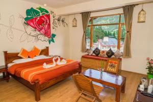 Postelja oz. postelje v sobi nastanitve Sparsh Resort, A Boutique Stay - Just 2kms uphill from Mall Road, near Old Manali