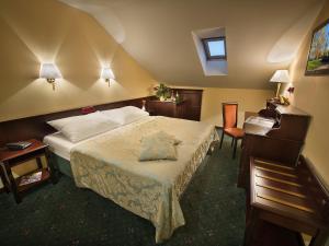 Posteľ alebo postele v izbe v ubytovaní EA Hotel Downtown