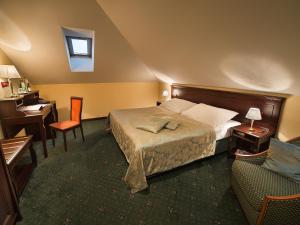 Posteľ alebo postele v izbe v ubytovaní EA Hotel Downtown