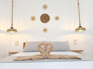 Ένα ή περισσότερα κρεβάτια σε δωμάτιο στο New Studio with Balcony , General Luna
