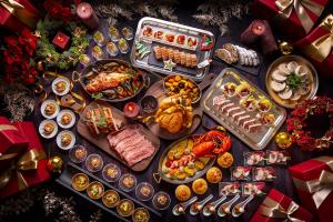 a table filled with different types of food at Conrad Tokyo in Tokyo