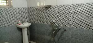 Ванная комната в Dreams home estate stay coorg B +30 фотографий