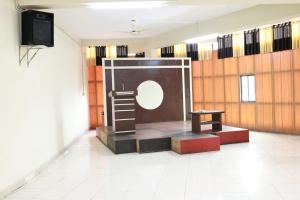 a room with a toilet in the middle of it at TAJ Residency in Mannārakkāt