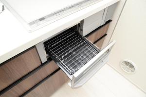 a drawer in a kitchen with a dishwasher at NYHotel 3 新宿2階建て3室1バスルーム1シャワー2トイレ in Tokyo