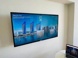 TV a/nebo společenská místnost v ubytování ORBI CITY GE
