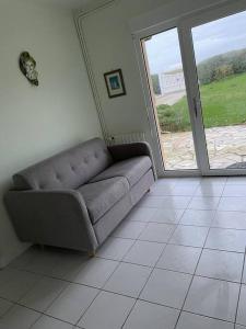 Χώρος καθιστικού στο Appartement RDC avec terrasse